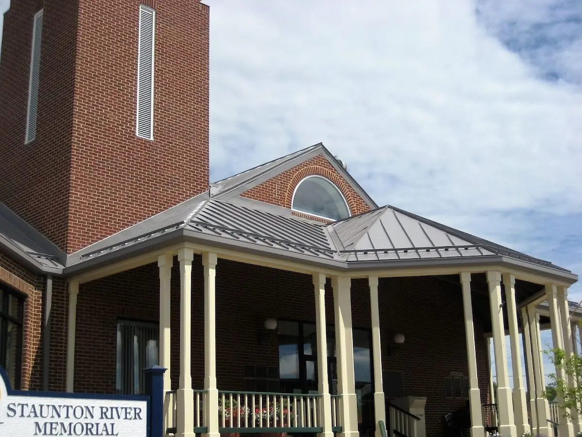 Skilled roofing craftsmen working on a residential roof in Winthrop Beach